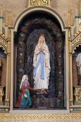 Fototapeta na wymiar Our Lady of Lourdes in the church of Saint Matthew in Stitar, Croatia 