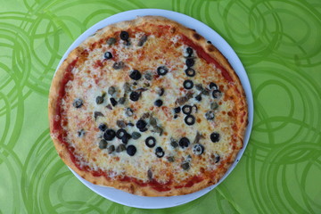 Italian pizza with capers and anchovies