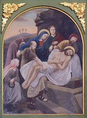 Fototapeta premium 14th Stations of the Cross, Jesus is laid in the tomb and covered in incense, church of Saint Matthew in Stitar, Croatia 