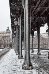 Snowfall over Pont de Bir-Hakeim, also known as viaduc de Passy - a bridge that cross the Seine River in Paris, France