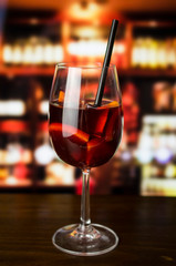 Glass of red vine on the table