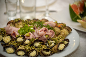 catering table set service with silverware and glass stemware at restaurant before party