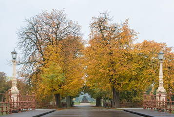 Bridge with autumn trees, Schwerin, Germany