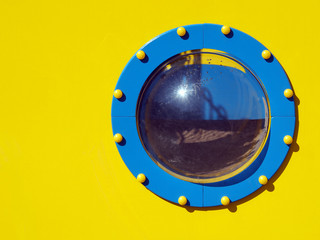 porthole in a yellow submarine
