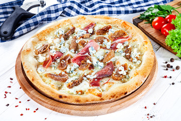 Close up view on pizza on white wooden background with ingridients. Italian cuisine. Ready to Eat. Restaurant, food menu, recipe, cafe concept. Lifestyle with copy space