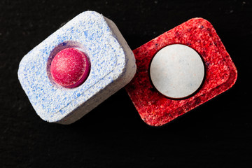 dishwasher tabs on black background
