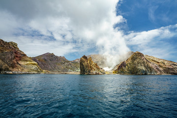 smoke over the volcano on white island, new zealand 12