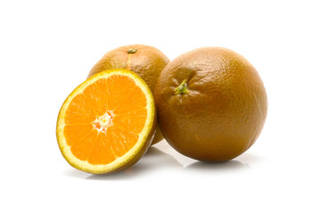Dark orange isolated on white background. Brown oranges on white.
