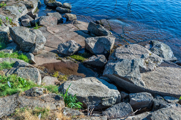 The shore and the bottom of Lake Valaam is formed from rock. The wonderful island Valaam is located on Lake Lodozhskoye, Karelia. Balaam - a step to heaven