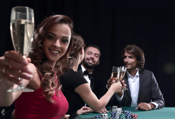 Girl drinking cocktail in casino