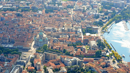 Naklejka premium Air view on Como with Como Cathedral and marina, at Lake Como in Ticino, Italy