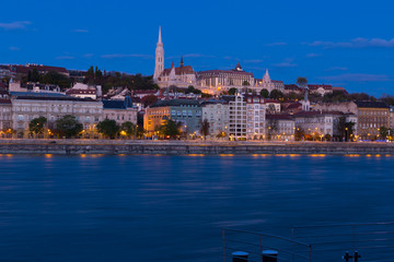 Fototapeta na wymiar Night illumination of Budapest with Matthias Church and Fisherman Bastion