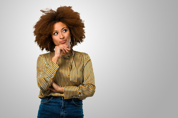 Afro woman thinking an idea
