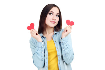 Beautiful woman holding paper hearts on white background