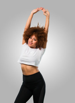 young fitness afro woman stretching