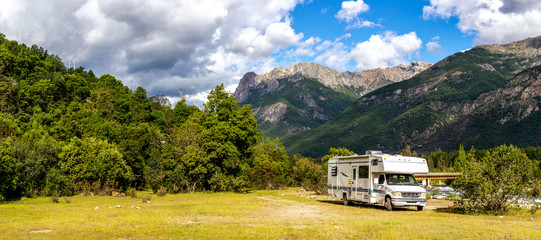 Motorhome in Chilean Argentine mountain Andes. Family trip travel vacation on Motorhome RV in Andes. - obrazy, fototapety, plakaty