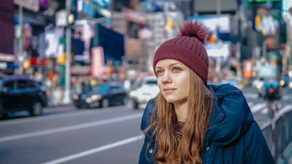 Young beautiful woman in the streets of New York for sightseeing