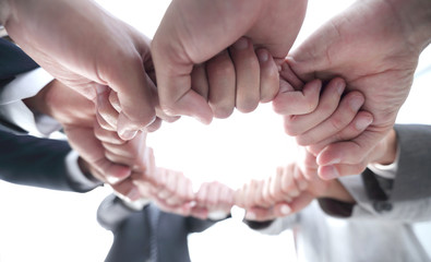 group of people joined their hands