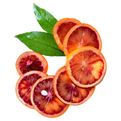 Blood orange slice with leaf top view isolated