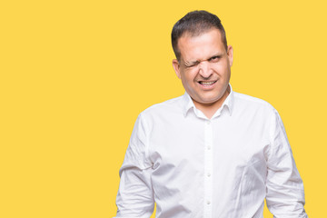 Middle age arab elegant man over isolated background winking looking at the camera with sexy...