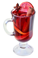 Mulled red wine with spices and red orange in a glass goblet