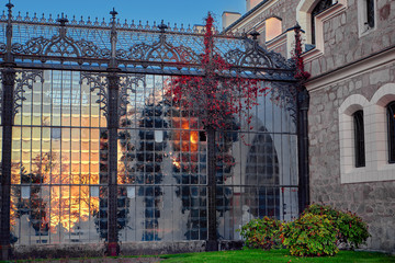 Gorgeous sun light reflection in glass garden of Hluboka nad Vltavou chateau. Sunset over Hluboka Castle, Czech Republic