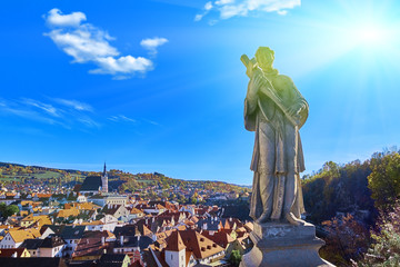 Obraz premium Beautiful sunset over historic centre of Chesky Krumlov old town in the South Bohemian Region of the Czech Republic on Vltava River. UNESCO World Heritage Site
