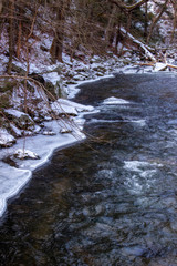 Naklejka premium River edged with ice