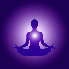 Silhouette of Person in yoga lotus asana on dark blue purple starry background with light