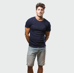 Young handsome man standing worried and overwhelmed, forgetful, realize something, expression of...