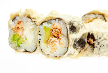 Japanese cuisine. Salmon sushi roll with rise isolated on white