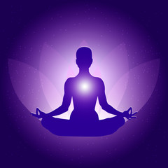 Fototapeta na wymiar Silhouette of Person in yoga lotus asana on dark blue purple background with lotus flower and light