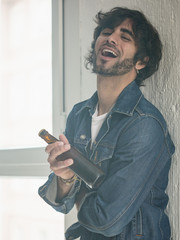 Young caucasian rock an roll man expressing emotions