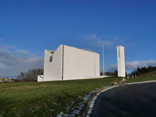 A white minimalist Church on a sunny day in Denmark