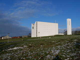 A white minimalist Church on a sunny day in Denmark