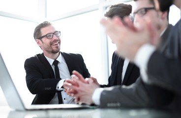 close up.meeting business partners at the Desk