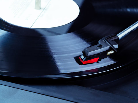 Close-up of a turntable needle. Equipment for DJ and nightclubs