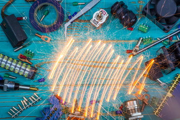 Tools and a set of components for use in electrical installations with a spark.