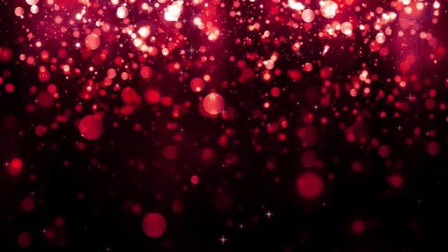 Red bokeh background with falling glitter particles. Beautiful festive sparkling background. Falling shiny particle with magic light. Valentines day. Seamless loop