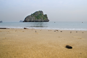 Stunning views of the quaint cliffs and the sea with turquoise water in the most famous place in Vietnam - Ha Long Bay.