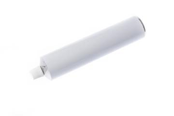 Close up of aluminum tube isolated on white background. Cosmetic or medicine gel.