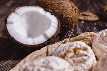 Juicy chopped coconut, coconut water in a wooden vessel and coconut chips are ready for use in cooking