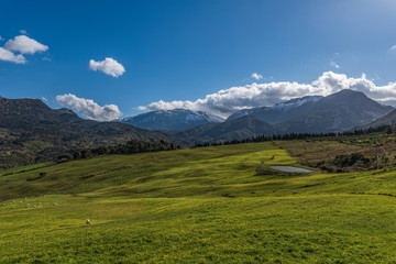 Fototapeta na wymiar Vista panoramica sulla valle con le cime innevate delle Madonie sullo sfondo, Collesano - provincia di Palermo IT