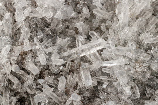 Macro mineral stone sulfite quartz on a black background