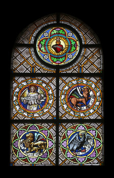 Symbols of the Evangelists, stained glass window in the parish church of St. Peter and Paul in Oberstaufen, Germany