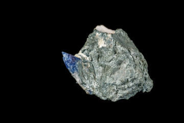 Macro mineral stone Bentorite on a black background
