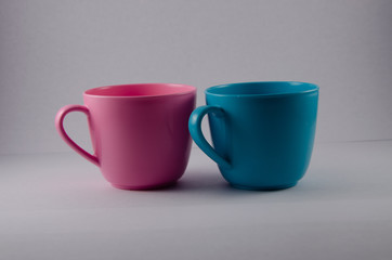 colorful cups isolated on white background