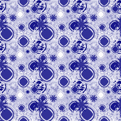 Seamless background pattern with a variety of colored floral motifs.