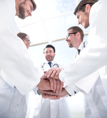 bottom view. close up of a doctors folded their hands together