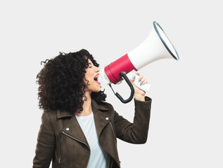 young woman holding a megaphone